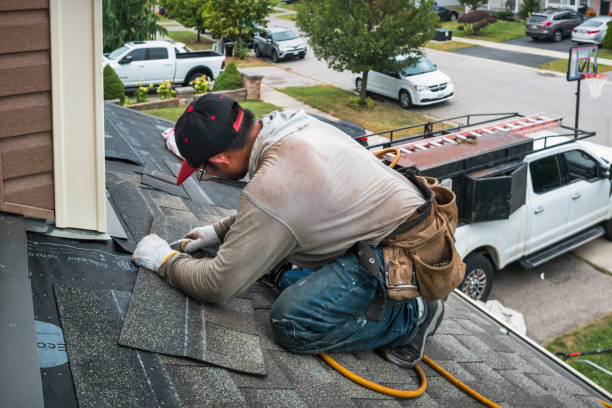 Professional Roofing technician working in Evart, MI